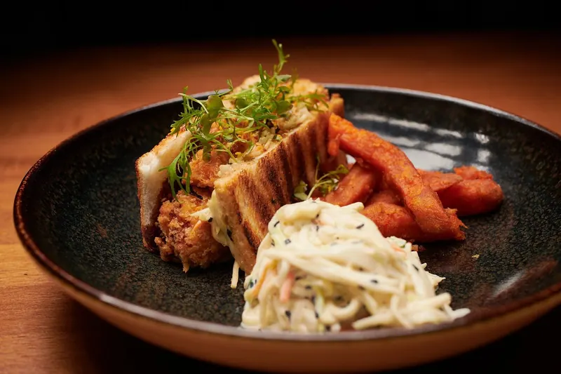 Sando with coleslaw and sweet potato fries